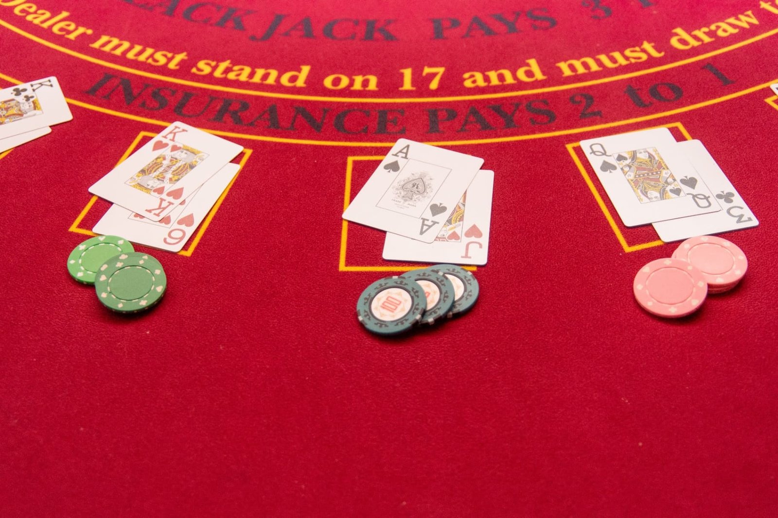 Blackjack table with cards and casino chips